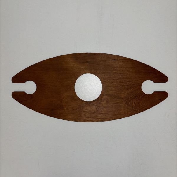 Oblong wine glass caddy with a hole in the middle to go on the neck of a wine bottle and two side slots to dangle stem wine glasses from.