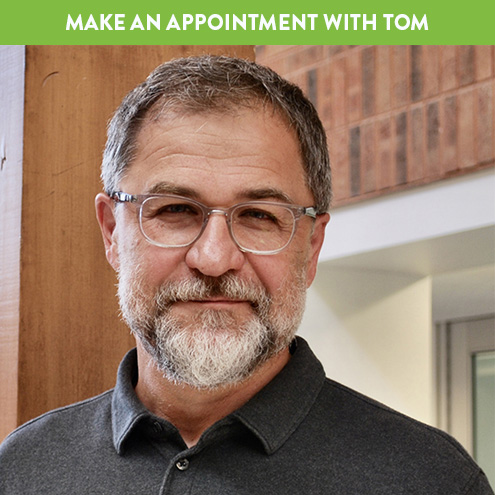 Image of smiling man, LINK to schedule a Digital Services appointment with Tom