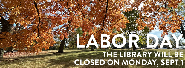 Photograph of trees with bright orange and gold leaves in autumn season, Labor Day, the Library will be closed on Monday, September 1